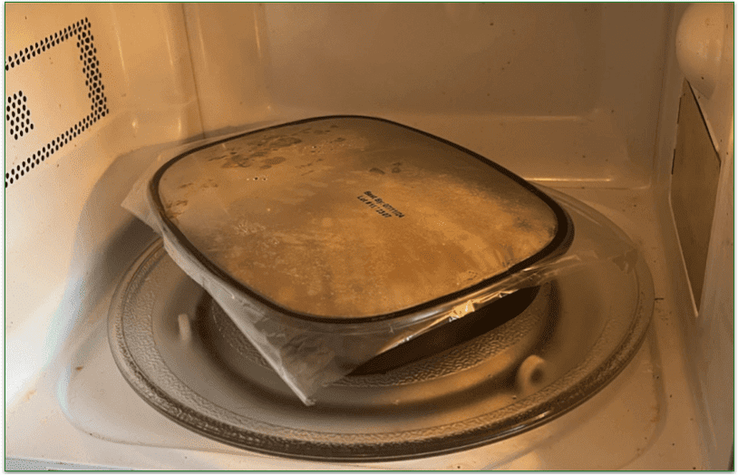 Only leave the plastic film on if heating in the microwave