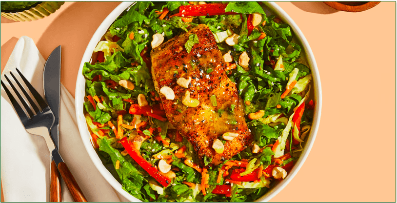Green Chef's Barramundi Over Carrot-Ginger Salad lettuce, bell pepper, cashews, sesame seeds, mint
