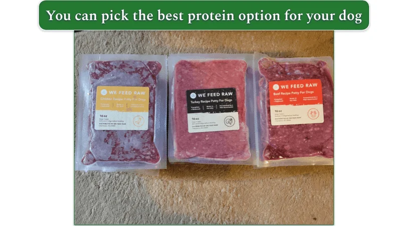 Three stacks of frozen We Feed Raw recipes