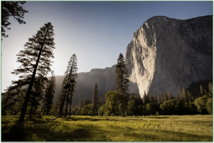 A beautiful landscape with mountains and trees.