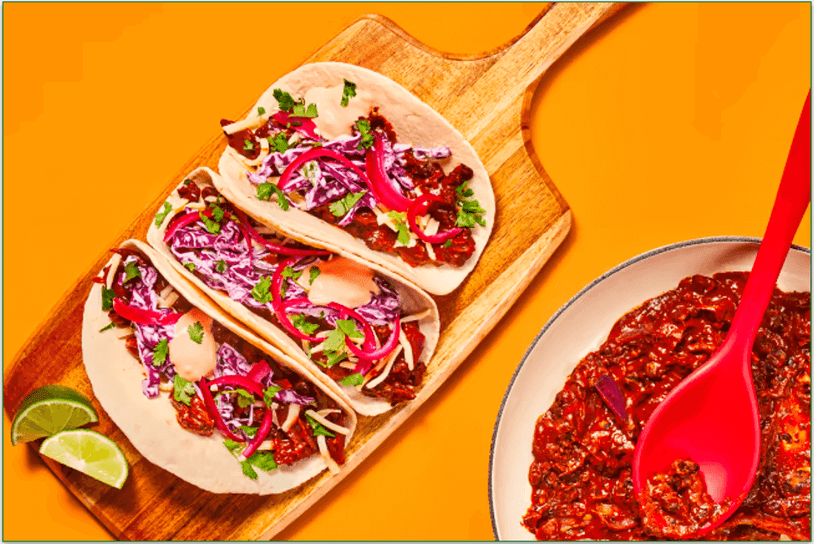 HelloFresh's One-Pan Chicken & Black Bean Tacos with Creamy Slaw, Pickled Onion & Red Pepper Crema