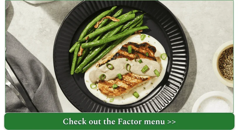 A pork chop on cauliflower mash with green beans