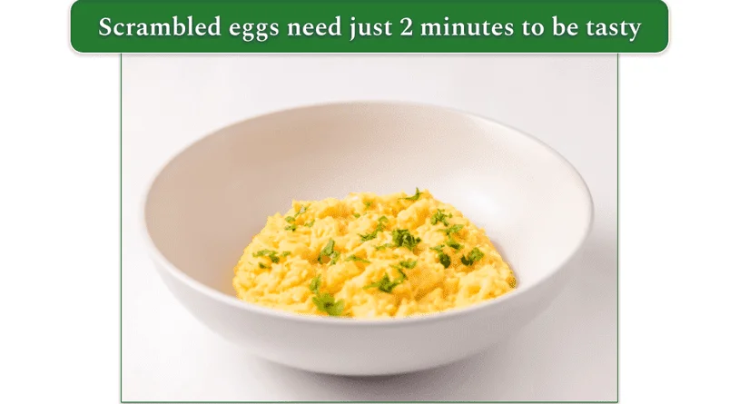 a bowl of creamy scrambled eggs