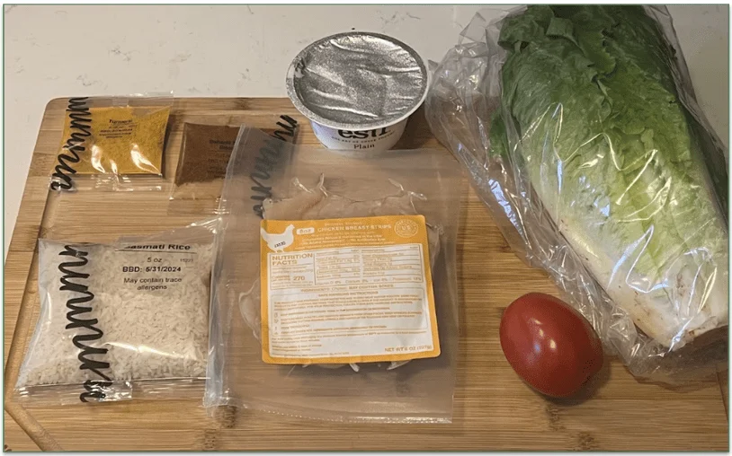 Photo of the 7 ingredients set out on a chopping board for a Dinnerly recipe