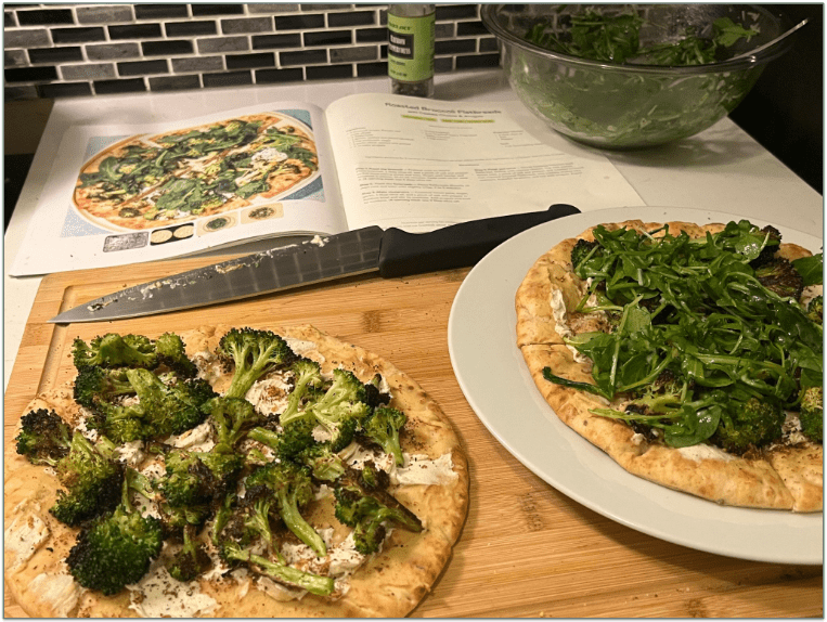 Purple Carrot meal kit with recipe card on a chopping board