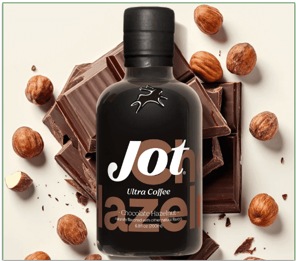 Image of a bottle of Jot's Chocolate Hazelnut coffee with chocolate and hazelnuts in the background