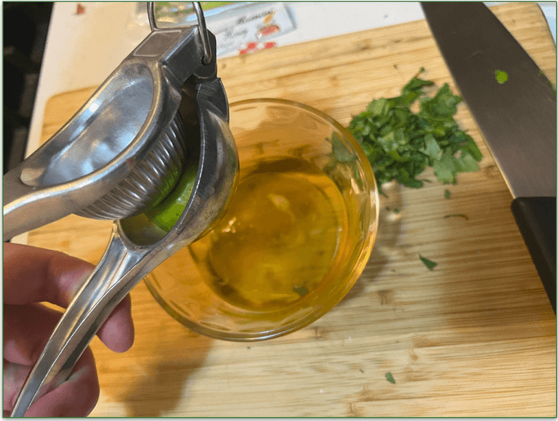 Image of our reviewer juicing a lime as part of meal kit prep