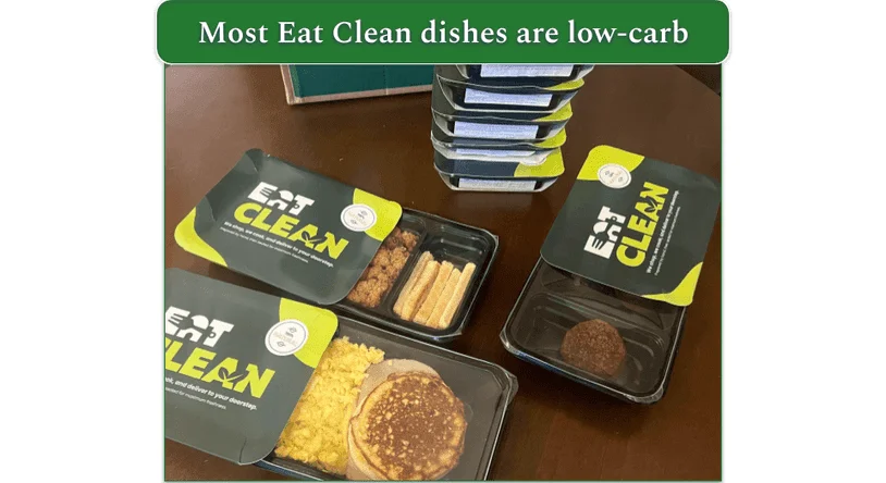 Stack of Eat Clean meals with three half out of their sleeves