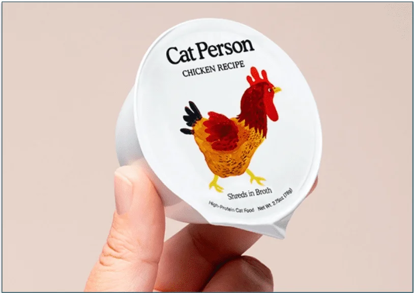 image of Cat Person's Chicken recipe in a plastic tub held in someone's hand