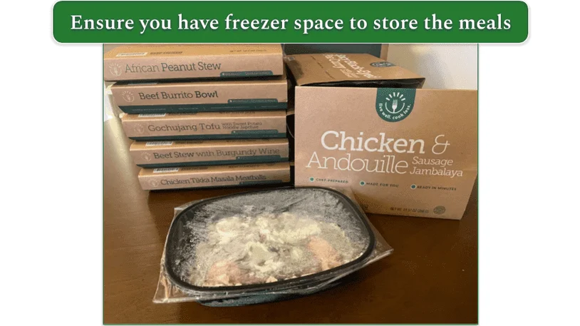 BistroMD meal boxes stacked up with a meal of Chicken Andouille at the front with plastic film still on