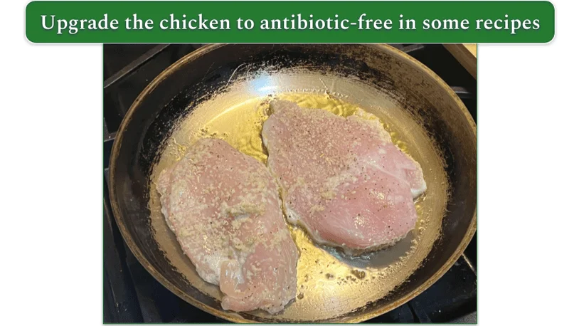 Chicken breasts cooking in a pan