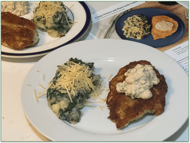 Reviewers own image of crispy chicken and black garlic crema