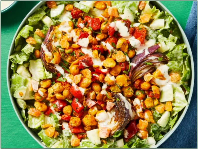 HelloFresh's Smashed Chickpea Chopped Salad with Roasted Red Onion, Dried Apricots & Creamy Greek Dressing