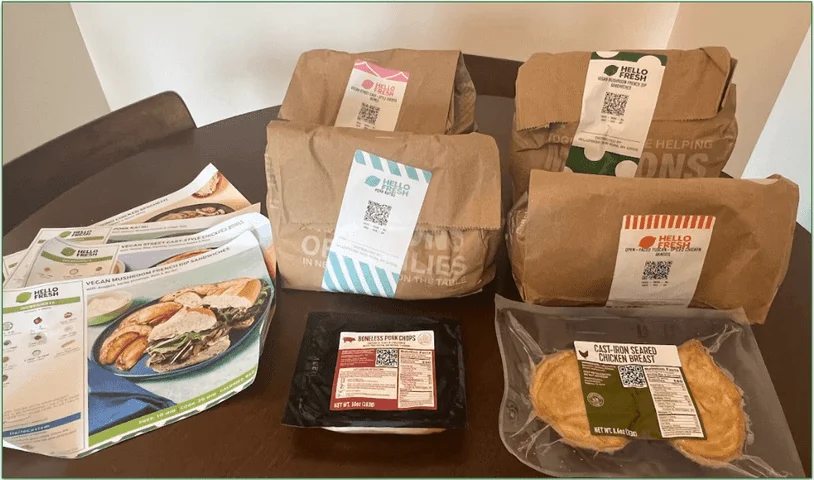 Image of HelloFresh's packed ingredients and recipe cards