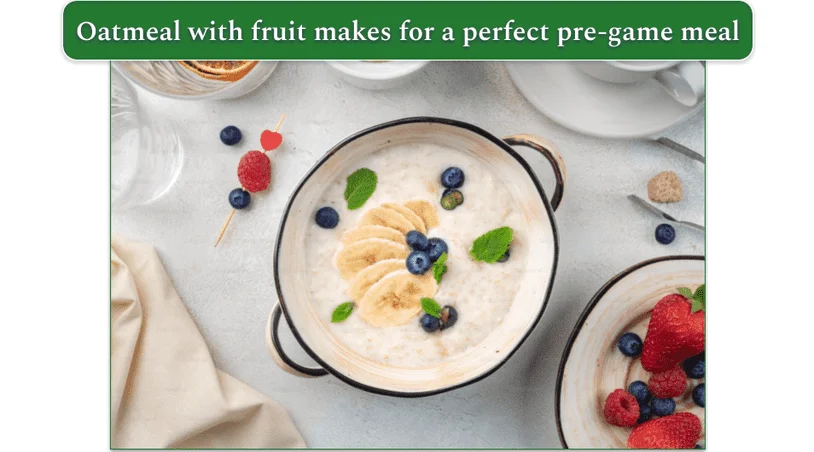 oatmeal with banana, mint leaves, and various other fruits in a bowl