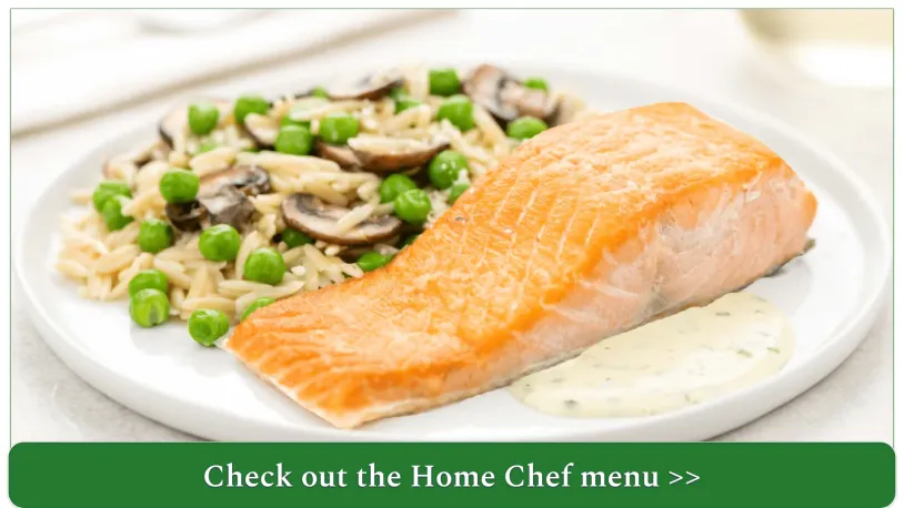 A plate of a slice of salmon with a side of rice and veggies, depicting a recipe option from Home Chef