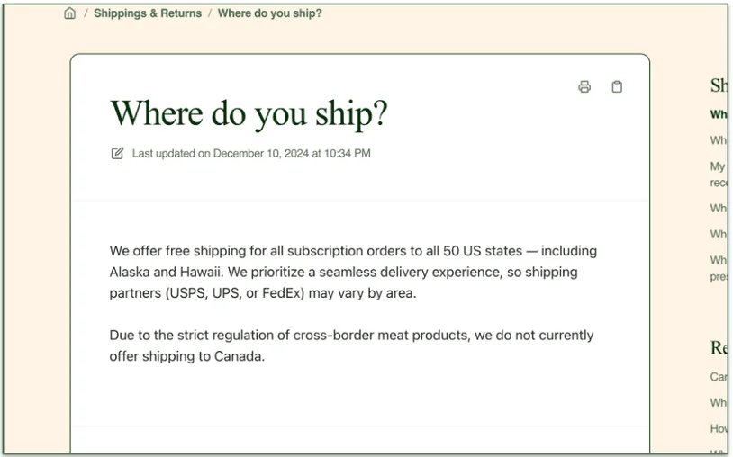 Small dog sitting next to Sundays delivery boxes