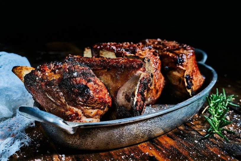 Featured image of a pork shoulder roast in a baking dish