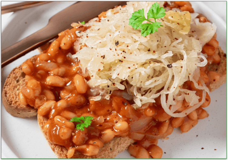 Beans on toast topped with sauerkraut