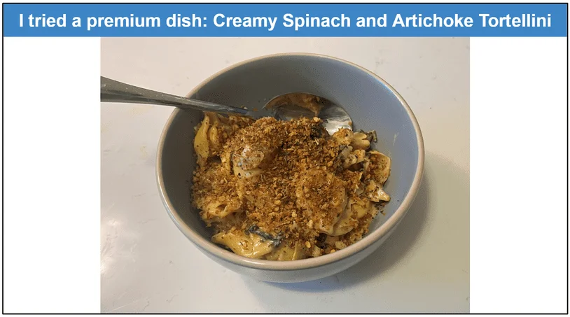 Image of Creamy Spinach and Artichoke Tortellini served in a bowl with a spoon