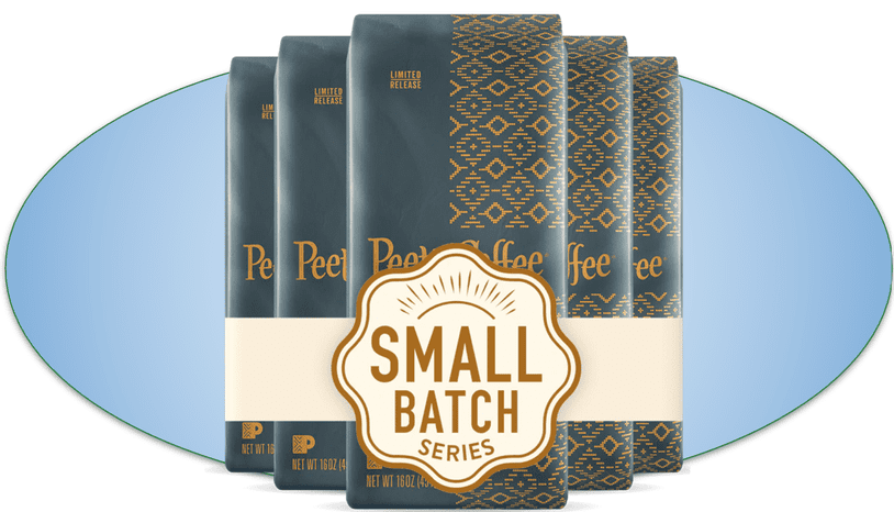 A set of Small Batch coffee packets with a light blue oval background