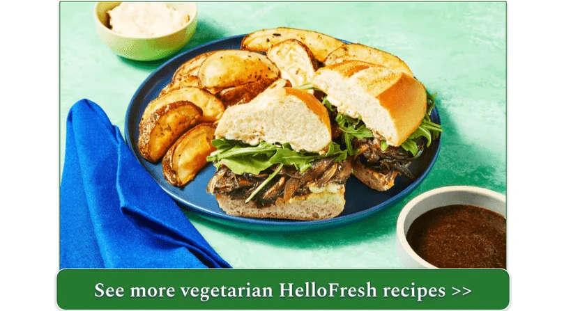 Vegan Mushroom Dip Sandwiches on a blue plate served with potato wedges
