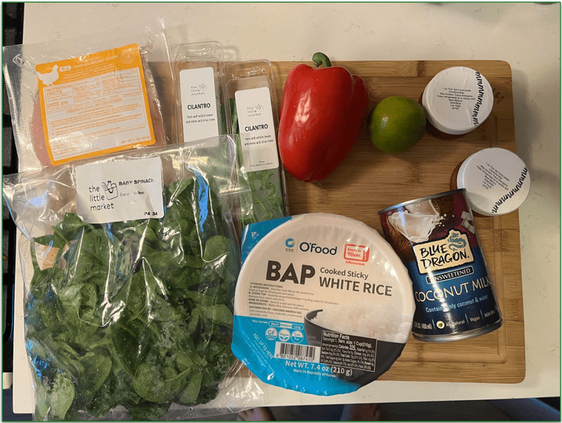 Dinnerly meal kit laid out on a chopping board