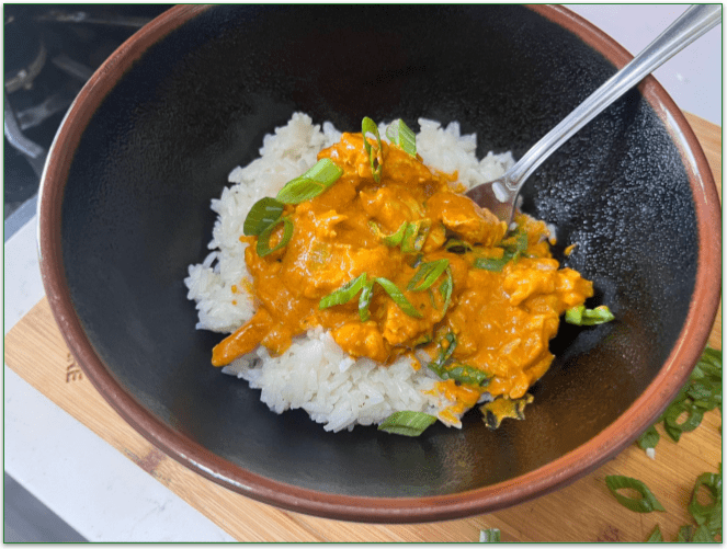 DeliveryRank reviewer's creamy chicken curry dish in a bowl
