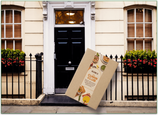 A Cumin Club package in front of a residential front door