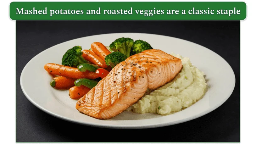 A plate of grilled salmon, roasted veggies, and mashed potatoes.
