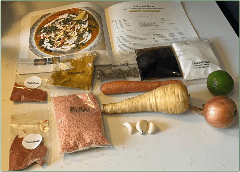 Purple Carrot’s Red Lentil Soup ingredients laid out with recipe card