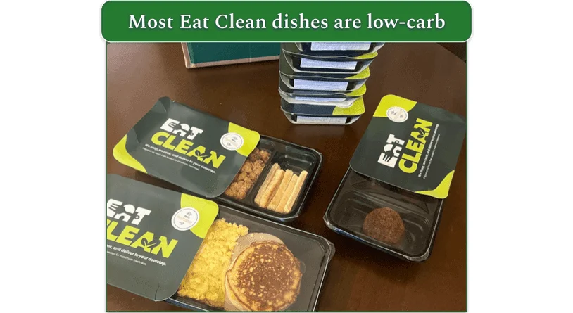 Stack of Eat Clean meals with three half out of their sleeves