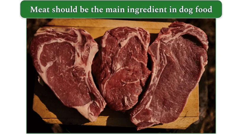 Three raw steaks on a chopping board