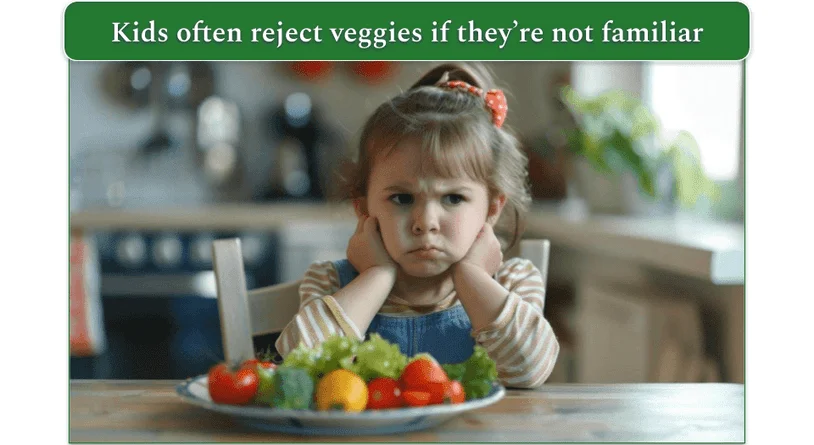 An angry kid reluctant to eat veggies on a plate in front of her.