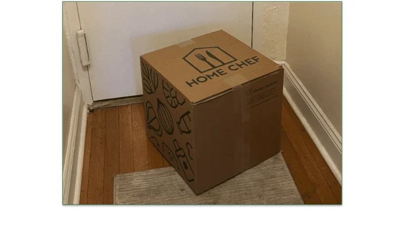 Photo of a Home Chef delivery box outside a door