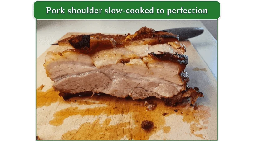 A piece of Ovent Pork Shoulder Roast recipe showing how juicy and tender it is