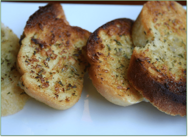 Garlic bread slices, fresh out of the oven
