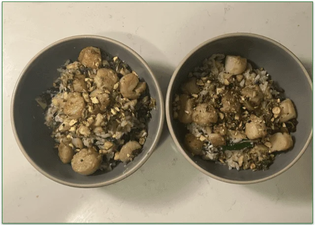 Photo of the of Seared Scallops & Garlic-Herb Risotto served in 2 bowls