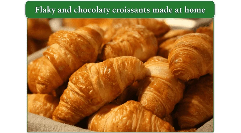 A bunch of home-made chocolate croissants in a bread basket