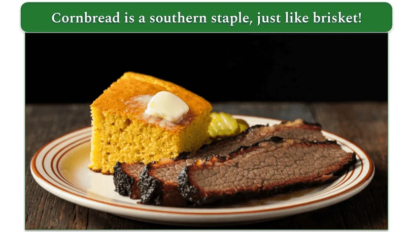 Cornbread with butter beside a bit of brisket meat.