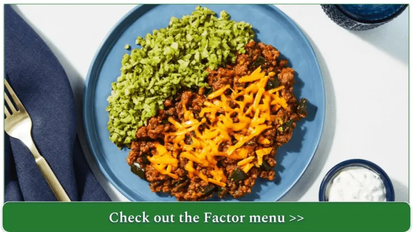 A plate of chopped broccoli and ground beef with cheese