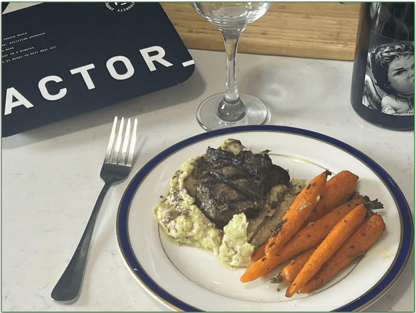 Factor’s Truffle Butter Filet Mignon served on a plate with carrots