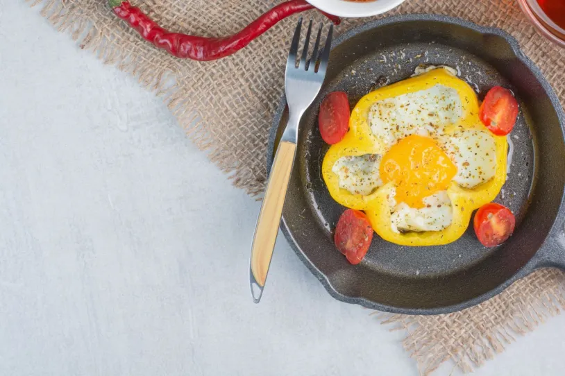 Fried egg in a pepper in a cast iron skillet