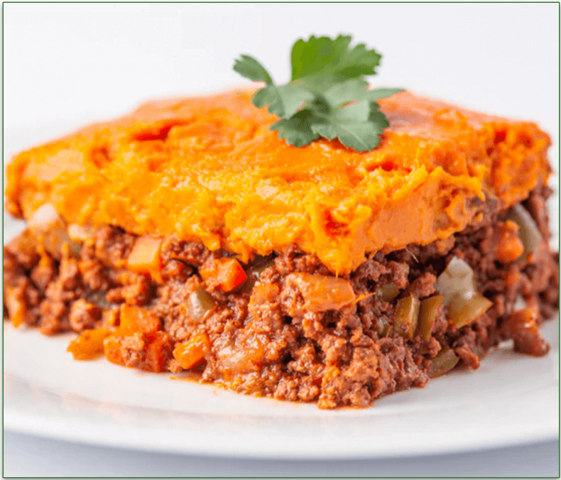 A slice of Elk Shepherd's Pie topped with squash