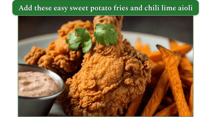 a plate of fried chicken, sweet potato fries, and chili lime aioli