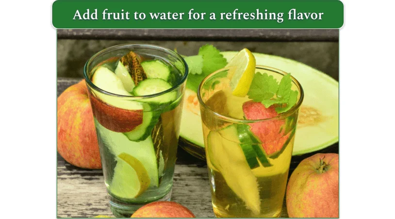 Glasses of water with sliced fruit inside