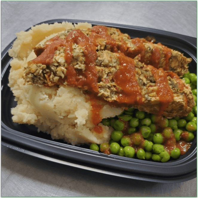 A MamaSezz meal in a microwave-friendly container