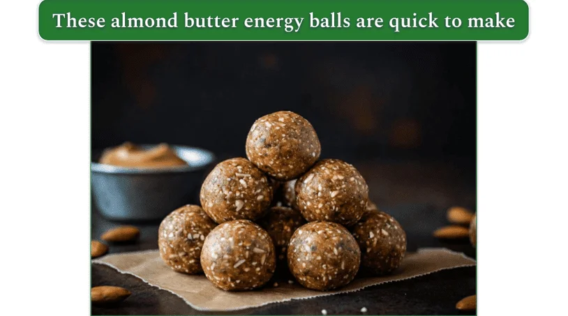 several almond butter energy balls on a table on top of some wax paper