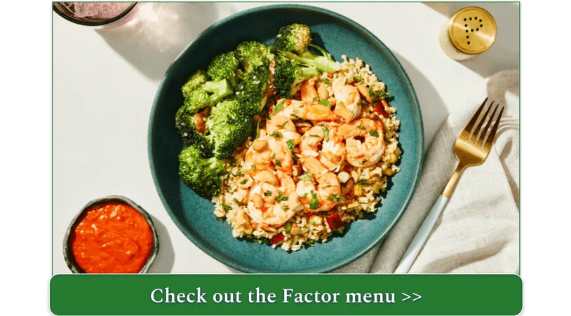 A plate of shrimp and broccoli 