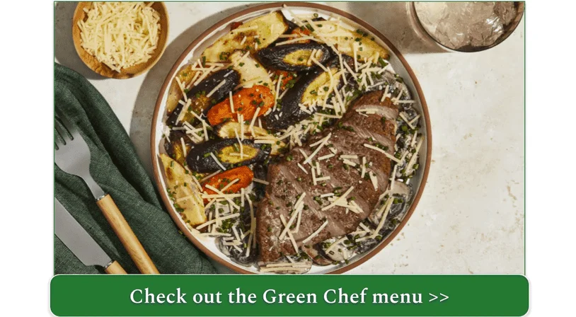 A plate of steak and roasted carrots